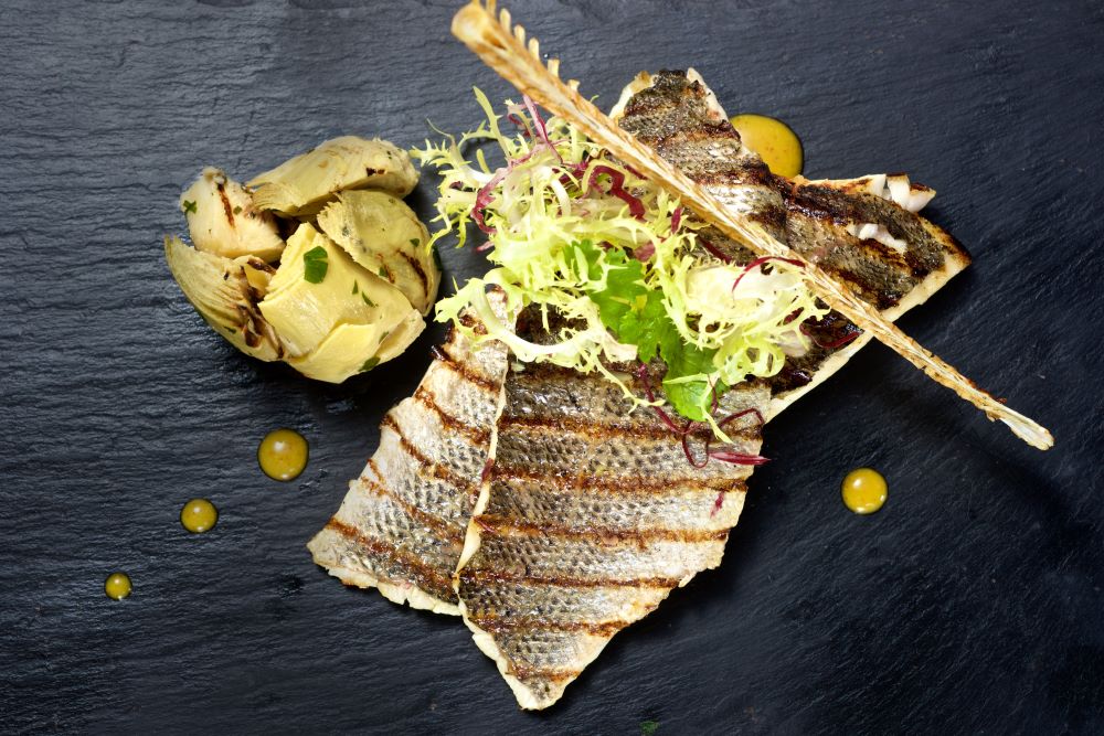 Sea Bass with Artichoke-Lemon Sauce - Frozen Fish Direct